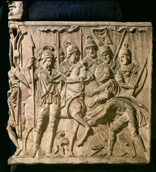 Relieve de un sarcófago que representa la sumisión de un bárbaro a una tropa romana